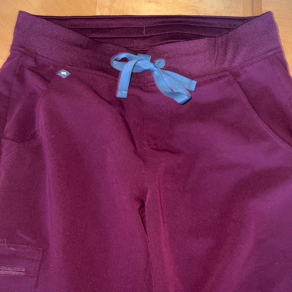 Figs maroon scrubs!